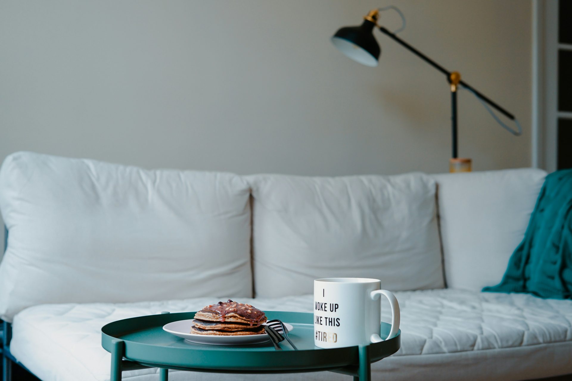 Pancakes and coffee on table